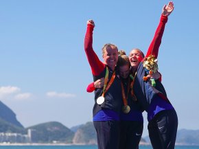 Silver medalist Hailey Danisewicz, Gold medalist Allysa Seely and Bronze medalist Melissa Stockwell of the United States celebrates on the podium at the medal ceremony for the Triathlon Women's T2 at Forte de Copacabana